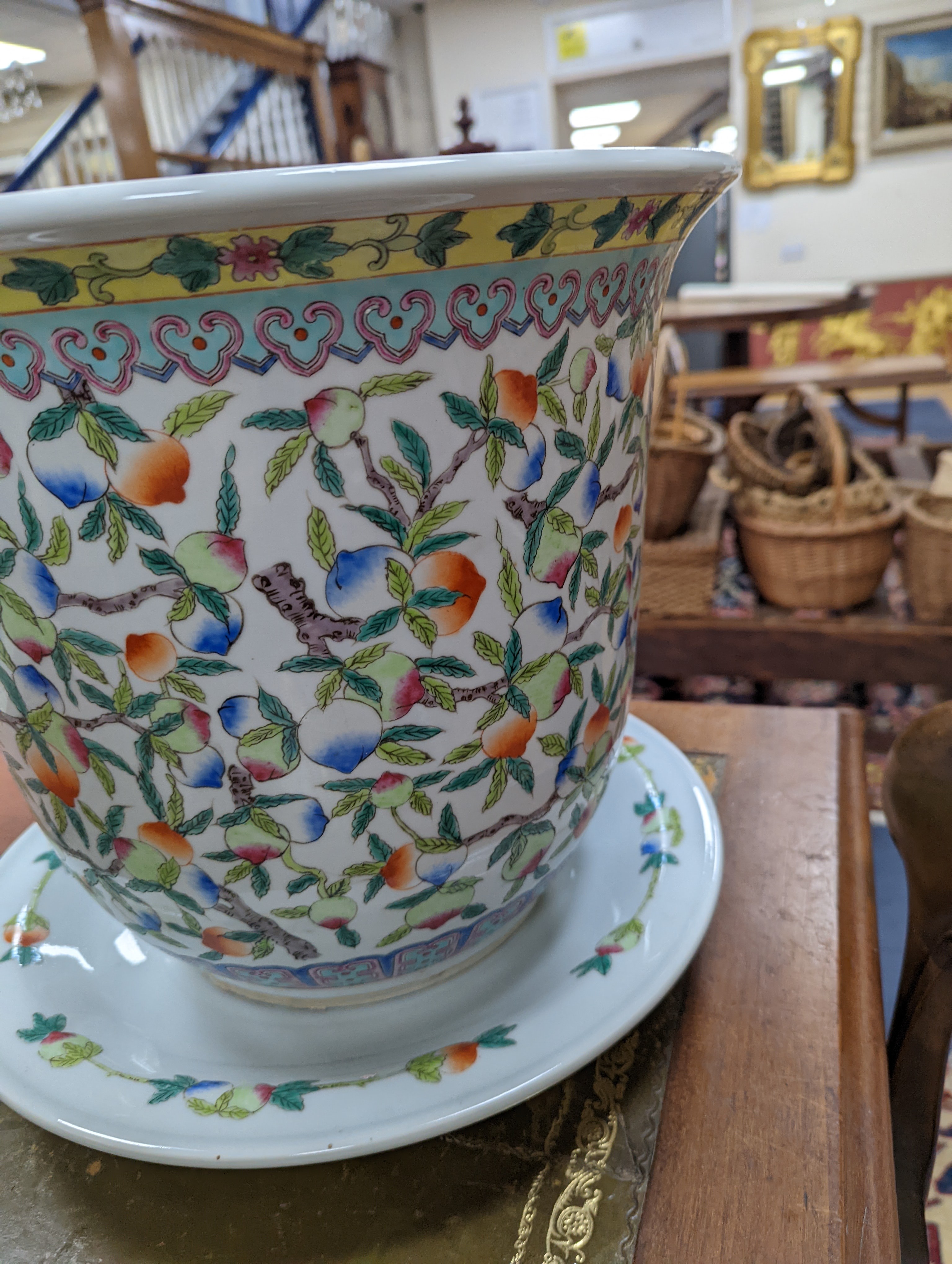 A 20th century Chinese porcelain jardiniere and dish, diameter 36 cms.